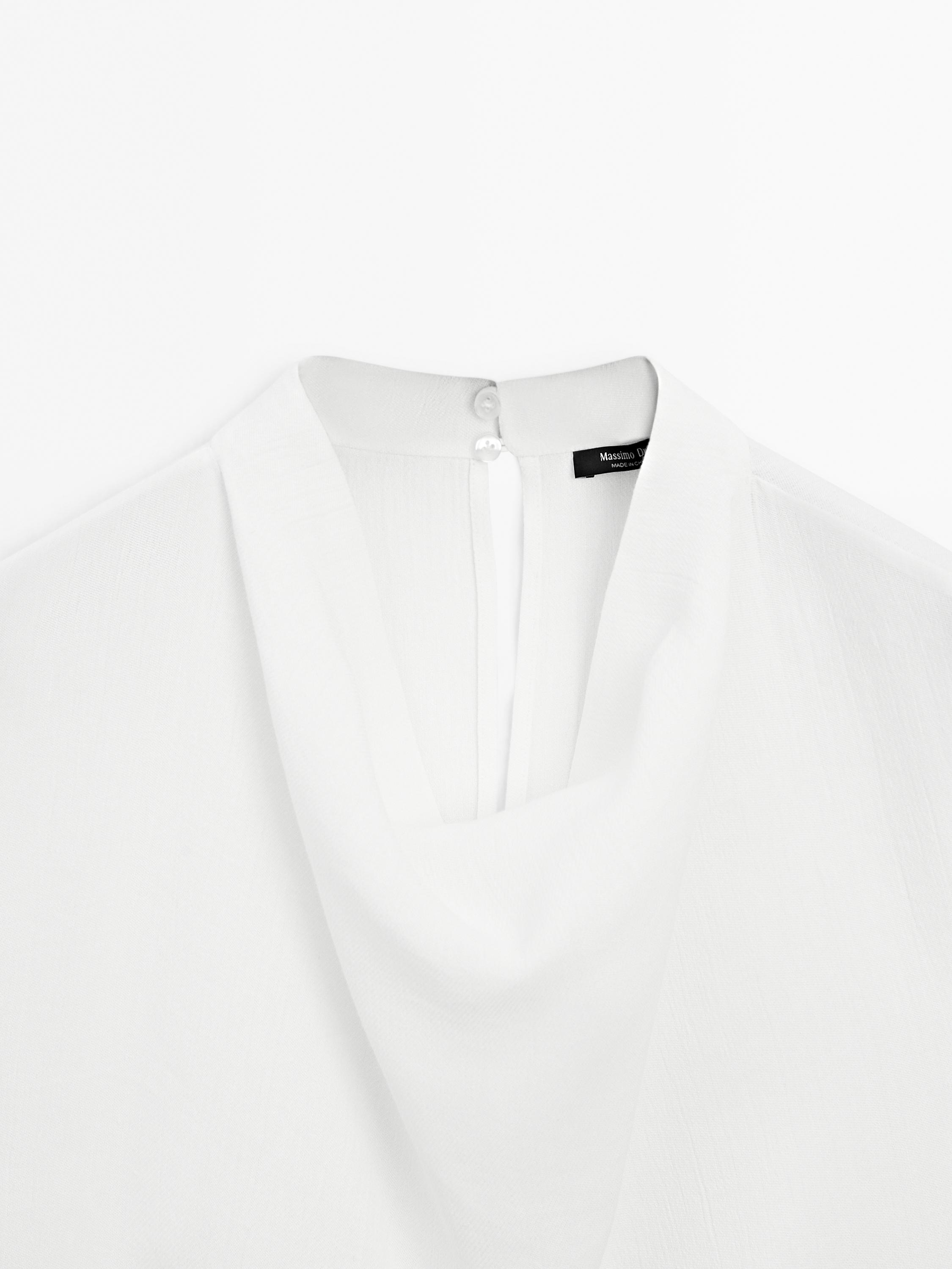 Flowing blouse with draped collar